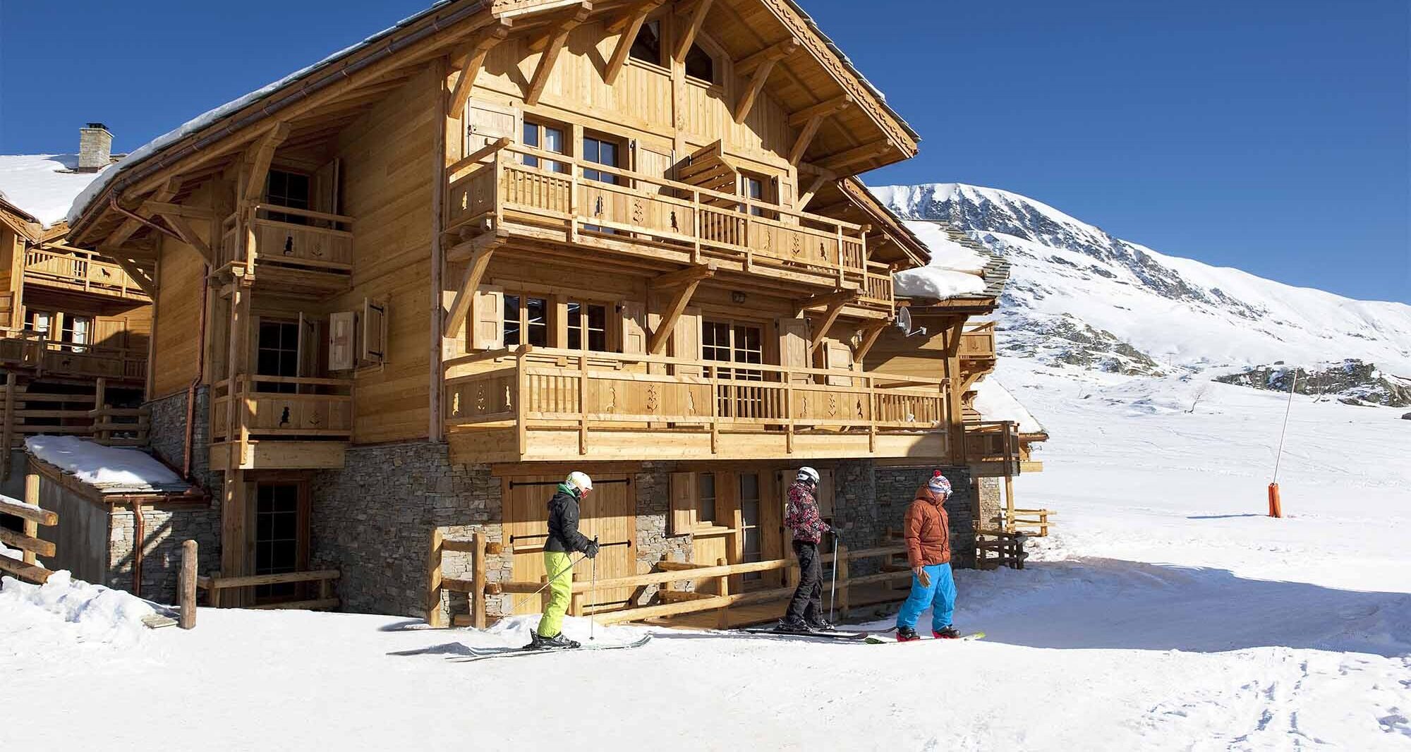 Chalet Le Manoir surrounded by snow in Alpe d'Huez Ski France Premium Chalets